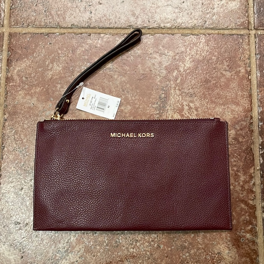 Michael Kors clutch. NWT